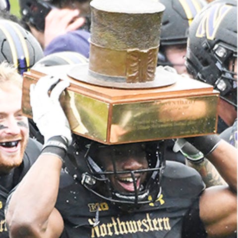Big Ten football teams play for 16 rivalry trophie