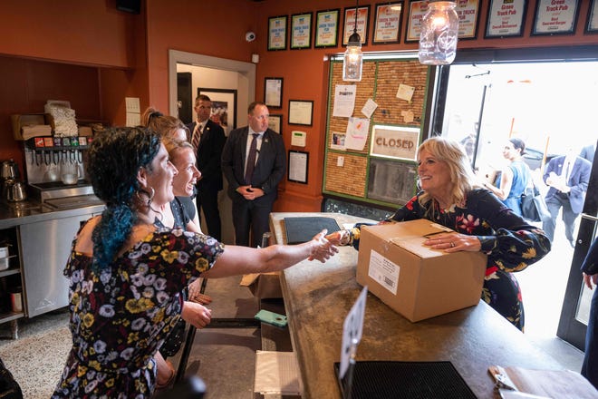 First lady Jill Biden gets a pie to go at Green Truck Neighborhood Pub in Savannah on July 8, 2021.