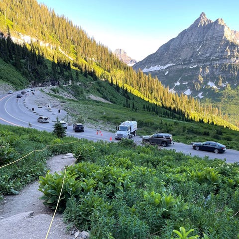 Cars stop to take pictures along Glacier National 