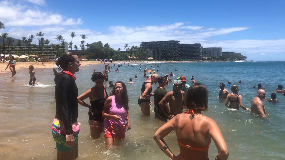 Kaanapali Beach, a popular tourist spot on the Hawaiian island of Maui, was busy on Monday, July 5. Maui  tourism, which essentially shut down for 7 months during the coronavirus pandemic, is approaching pre-pandemic levels by some measures.