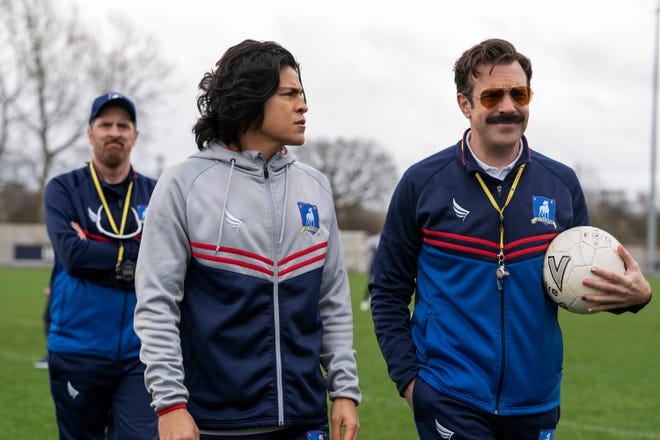 Brendan Hunt as Coach Beard, Cristo Fernández as Danny Rojas and Jason Sudeikis as Ted in “Ted Lasso" Season 2.