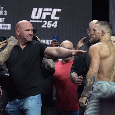 Dustin Poirier and Conor McGregor are separated by