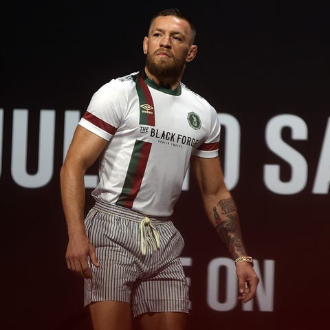 Conor McGregor takes the stage during a ceremonial
