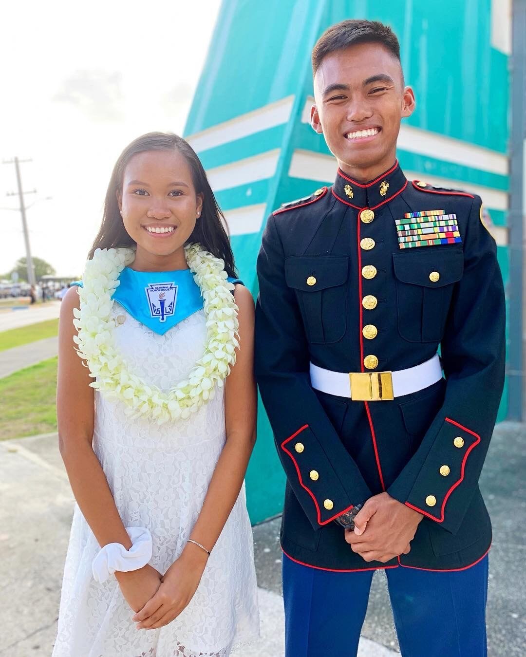 Jean Bactad, left, and her partner and recent Naval Academy appointee Alexander Reglos Saber, right, at Okkodo High School's 2019 graduation at the University of Guam fieldhouse. The young couple has kept the sparks flying in their relationship despite the difficulties of a long-distance relationship.
