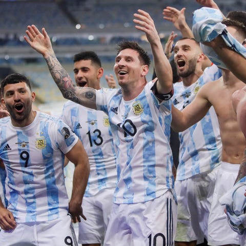 Lionel Messi and Argentina celebrate after defeati