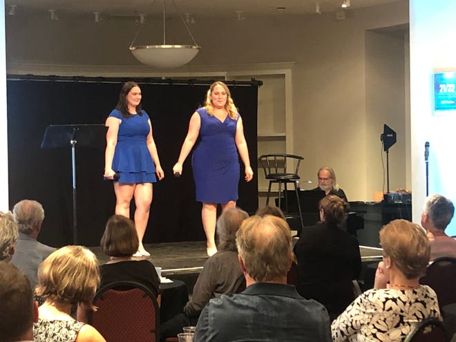 Zoe Smith and Lacey Knispel perform a song from the upcoming 92nd season during a preview program for the Players Centre for Performing Arts.