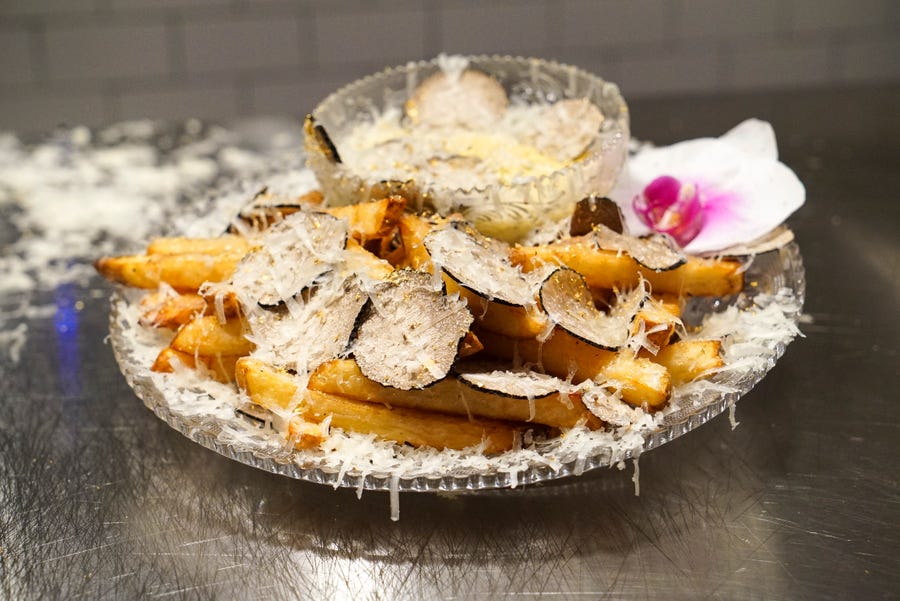 The Creme de la Creme Pommes Frites, finished with 23K edible gold dust, cost $200.