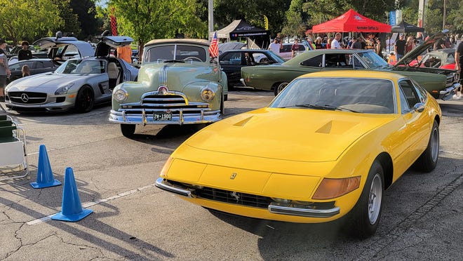 Caffeine and Octane Jacksonville will showcase some serious collectible cars at each monthly event, the inaugural parking cars like this Ferrari 365GTB4 "Daytona" in Giallo Modena yellow, next to a 1947 Pontiac and Mercedes-Benz SLS AMG.