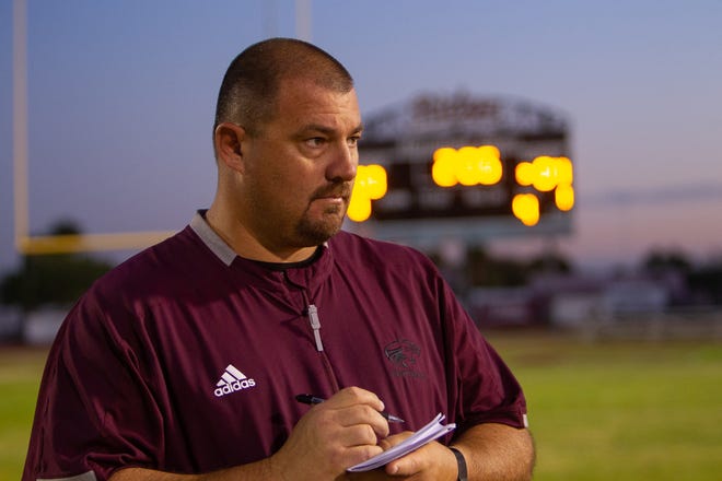 Mountain Ridge High School football coach Doug Madoski also leads the Maricopa Mustangs, which plays in the Hohokam Junior College Athletic Conference,  Nov. 4, 2019. Carly Bowling/The Republic.