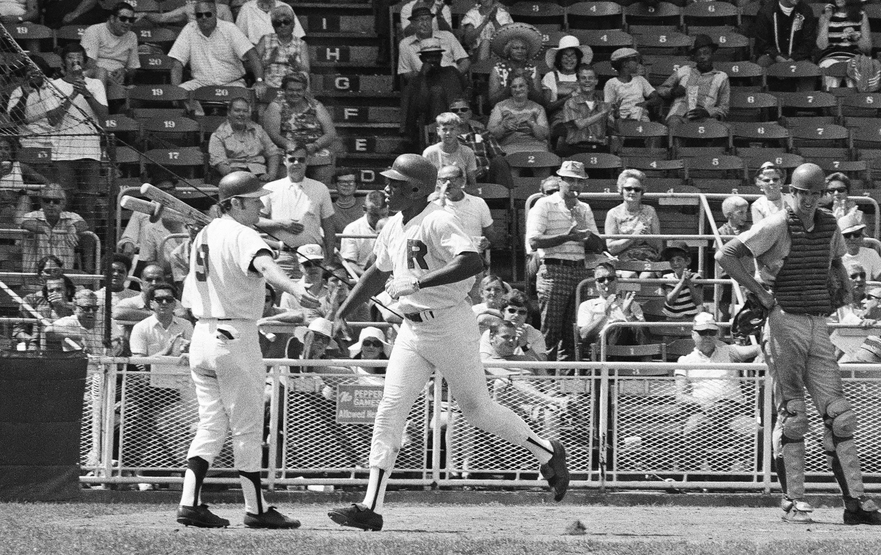 Red Wings left fielder Don Baylor is congratulated by teammate Don Fazio (9), left, as scoring against Winnipeg on August 8, 1971 at Silver Stadium. The Wings would win the game 10-3.