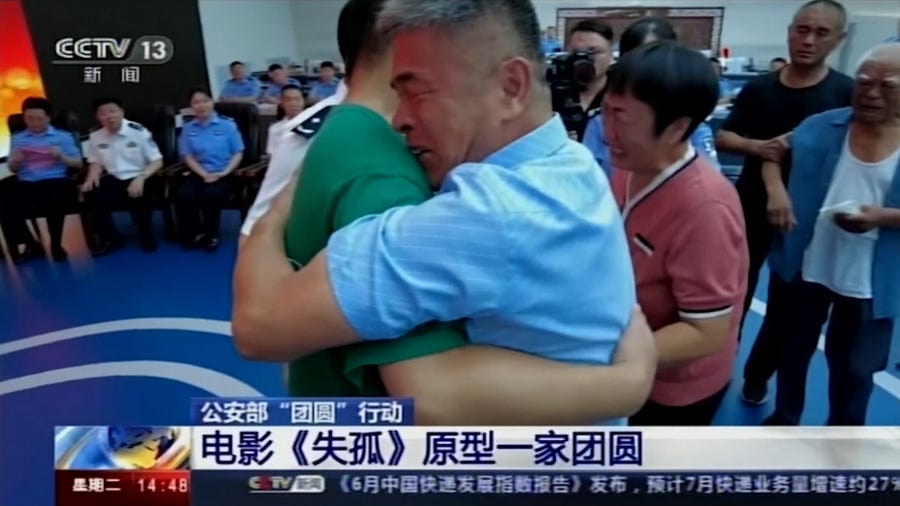 Chinese parents, abducted son reunite 24 years on
