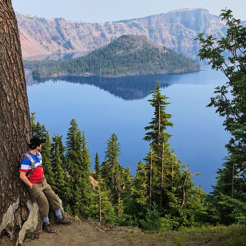 Sam Fong looks out at Crater Lake in Oregon in 202