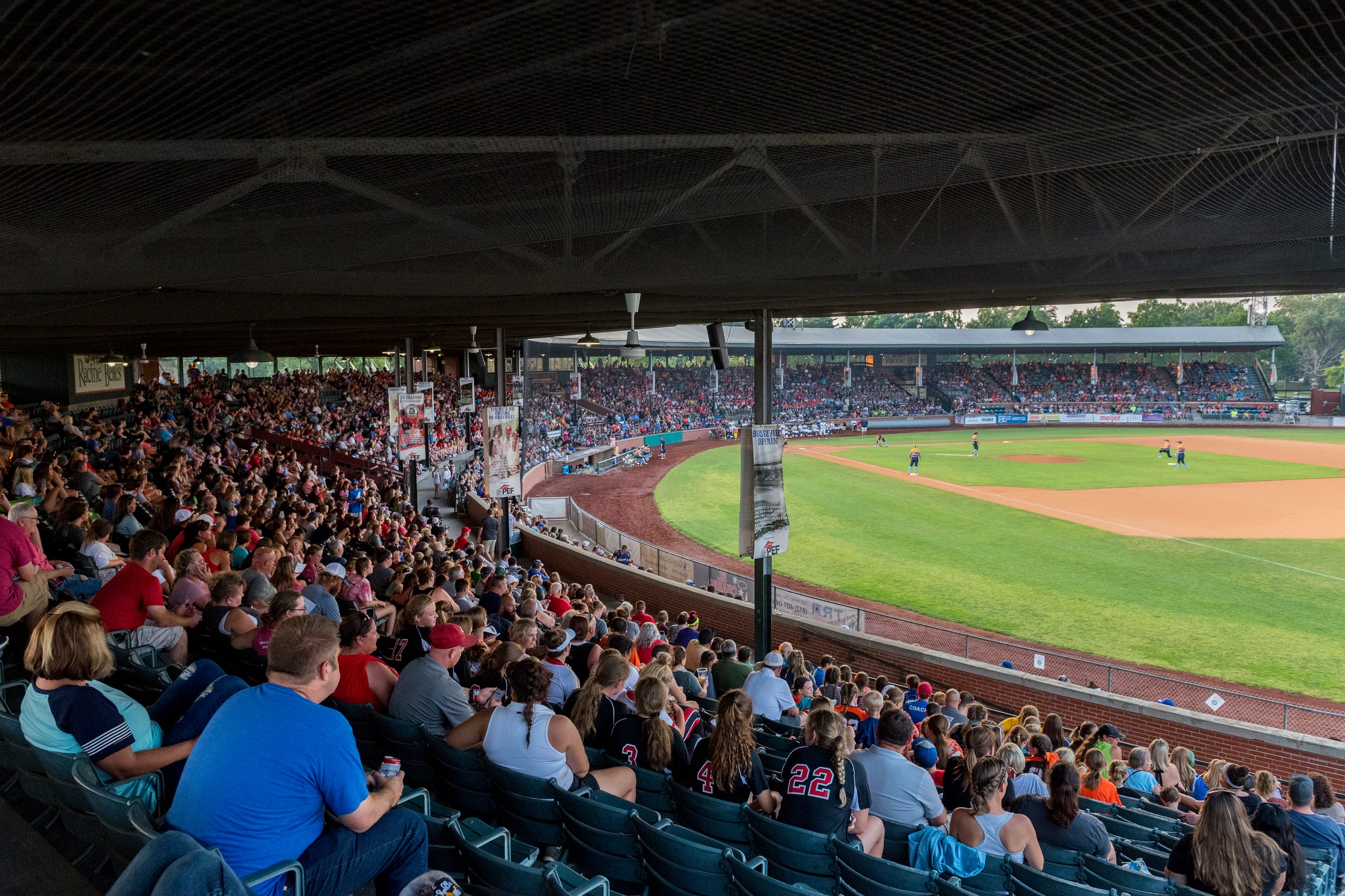 A large crowd fills the stands for the exhibition game between USSSA Pride and Team Florida at Bosse Field in Evansville, Ind., Wednesday evening, July 14, 2021.