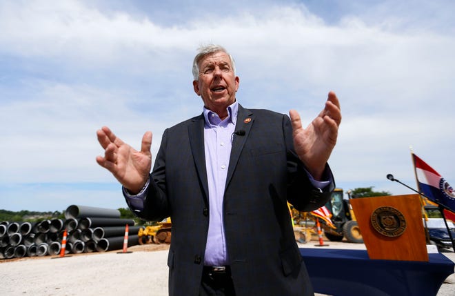 Gov. Mike Parson takes questions about COVID-19 after signing a bill on July 15, 2021. Parson criticized the new round of vaccination requirements from the White House on Thursday, and left open the possibility of calling a special legislative session for state lawmakers to take action in response.