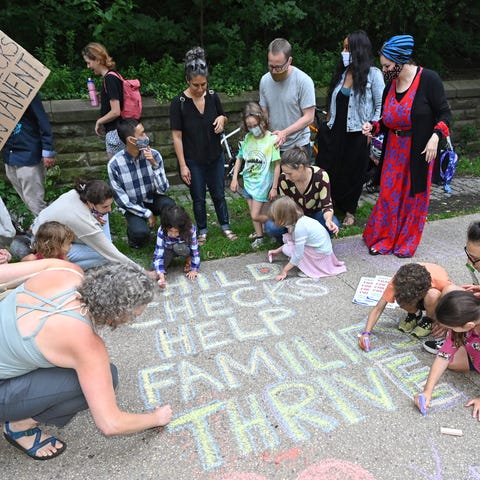 Parents and children celebrate new monthly Child T