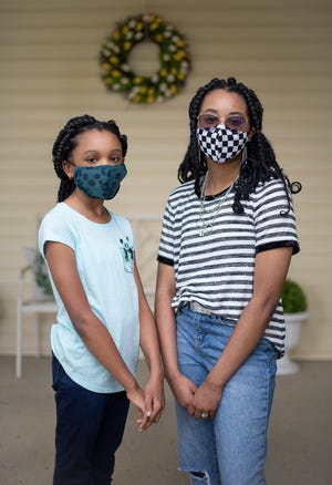 Jordyn Mitchell, 10, will be a fifth grader at Scottwood Elementary. Her older sister, Jenesis, 13, will be in eighth grade at Sherwood Middle School. Because of Jordyn's type 1 diabetes and still being too young for a COVID-19 vaccination, their mother, Dorcas Mitchell, worries about Columbus City Schools dropping its mask requirement.