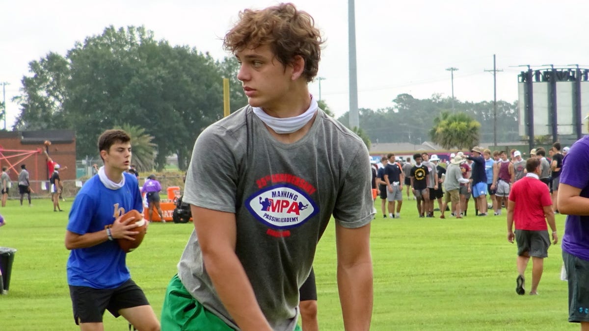 Isidore Newman 2023 quarterback Arch Manning participates in a drill at the Manning Passing Academy held at Nicholls State in Thibodaux on July 16.