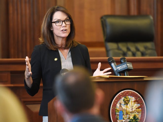 State Attorney Melissa Nelson addresses the audience during the ceremony to release the findings of the Juvenile Justice Advisory Committee in 2019.