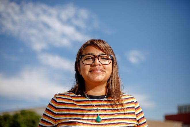Veronica Vieyra, San Jose State University Class of 2021 graduate poses for a photograph on campus in San Jose on Saturday, July 3, 2021. Vieyra is one of 72 foster youth to receive payments of $1,000 a month in Santa Clara county’s first guaranteed basic income pilot program.