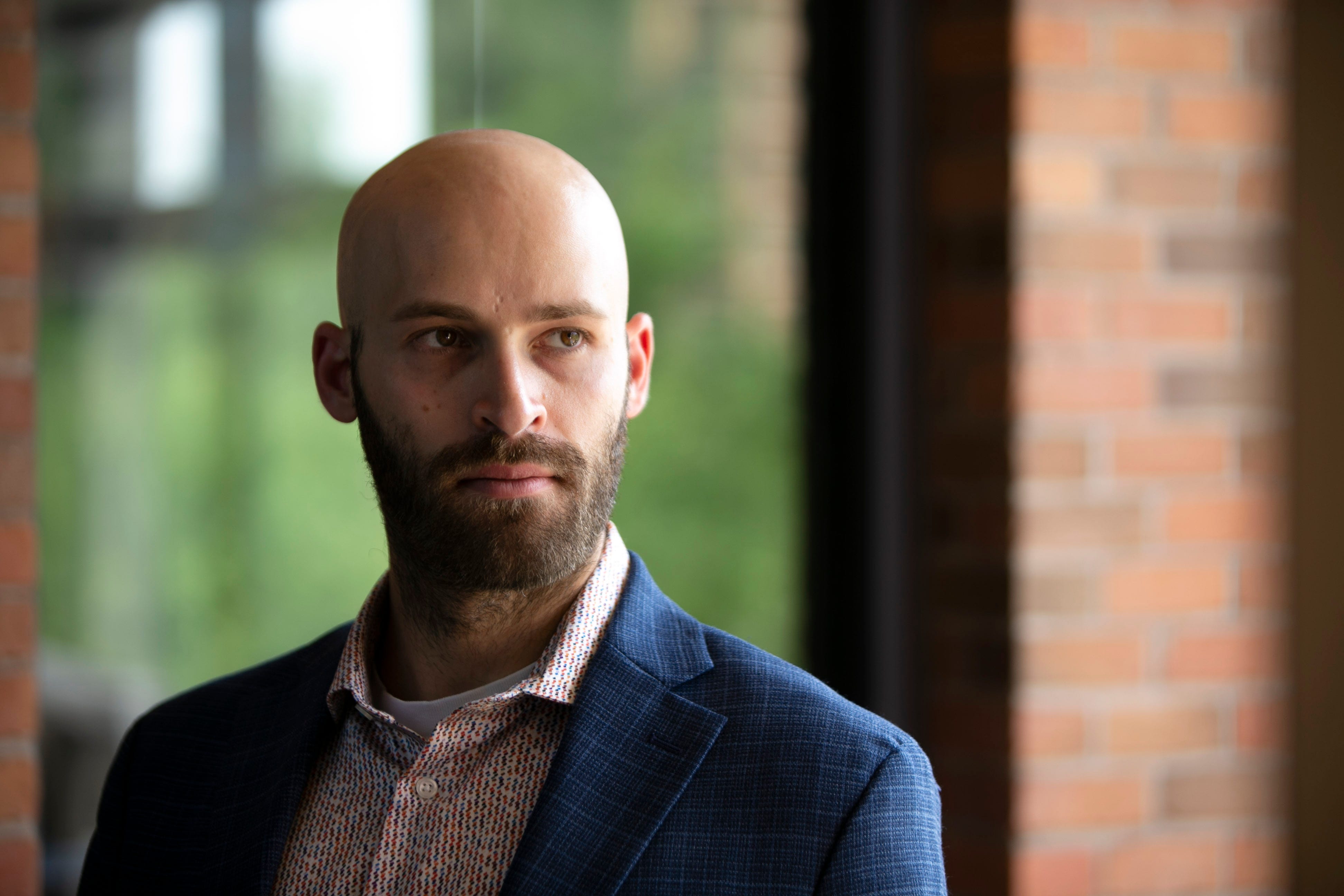 Jonathan Udell is an attorney with the Rose Law Group and a communications director with Arizona NORML. He is seen at the Rose Law Group offices in Scottsdale on July 16, 2021.