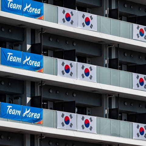 South Korea flags and signage are displayed at the