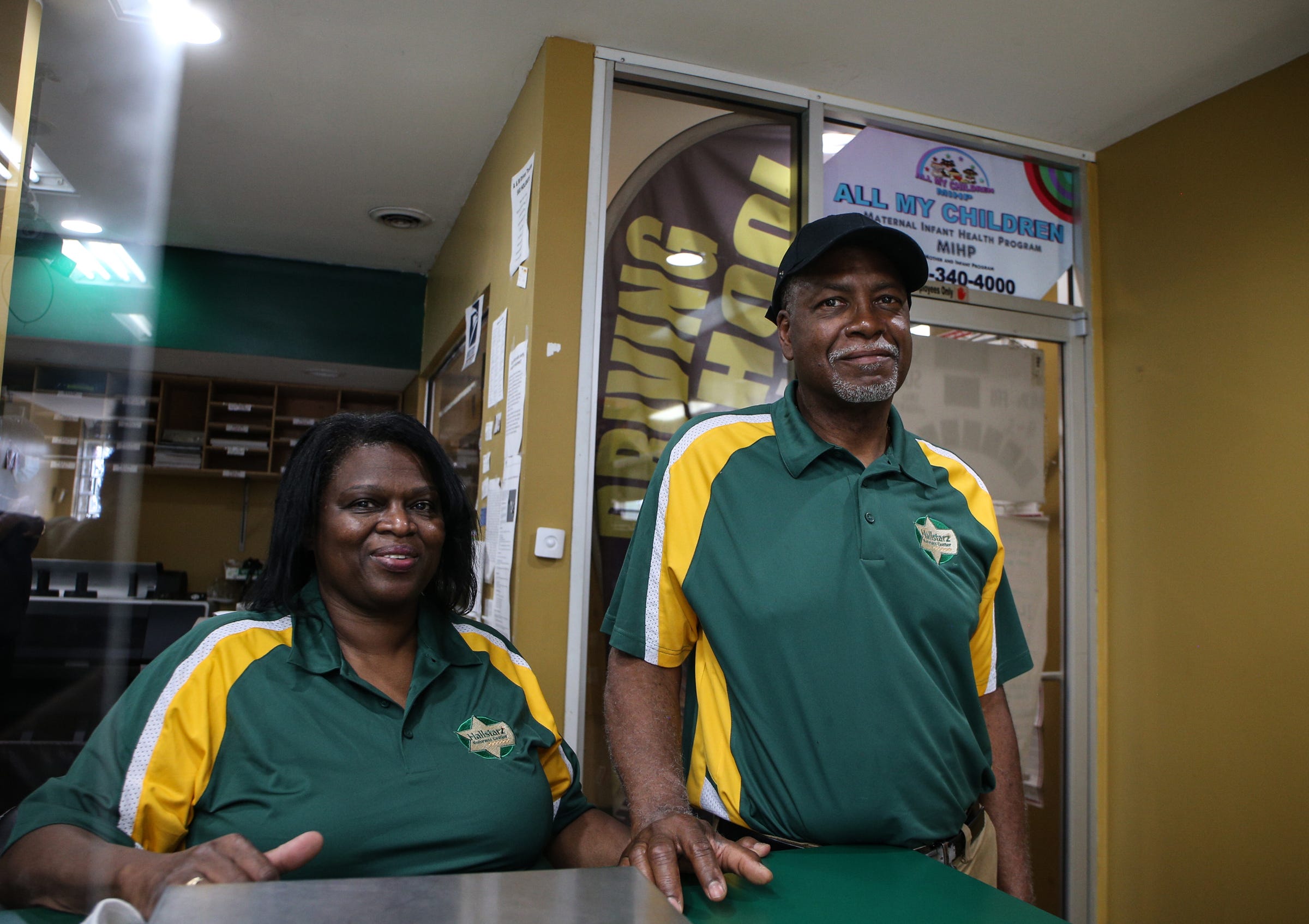 Vanessa Hall and Milton Hall Jr. pose for a photo inside of Hallstarz Business Center in Detroit on July 15, 2021. The business center is a one-stop-shop in the Bagley neighborhood. A neighborhood source for packing, shipping, printing and other business services. Created 36 years ago by a Detroit couple, Milton Hall Jr. and Vanessa Hall. The business is now run by their oldest son, Mario Hall with help from his five brothers.