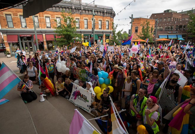 Participants gather at the end of the third annual NoCo Pride March by NoCoSafeSpace in Old Town Fort Collins, Colo.