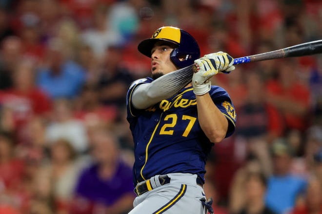 Milwaukee Brewers' Willy Adames bats during a baseball game against the Cincinnati Reds in Cincinnati, Friday, July 16, 2021. The Brewers won 11-6. (AP Photo/Aaron Doster) ORG XMIT: OHAD