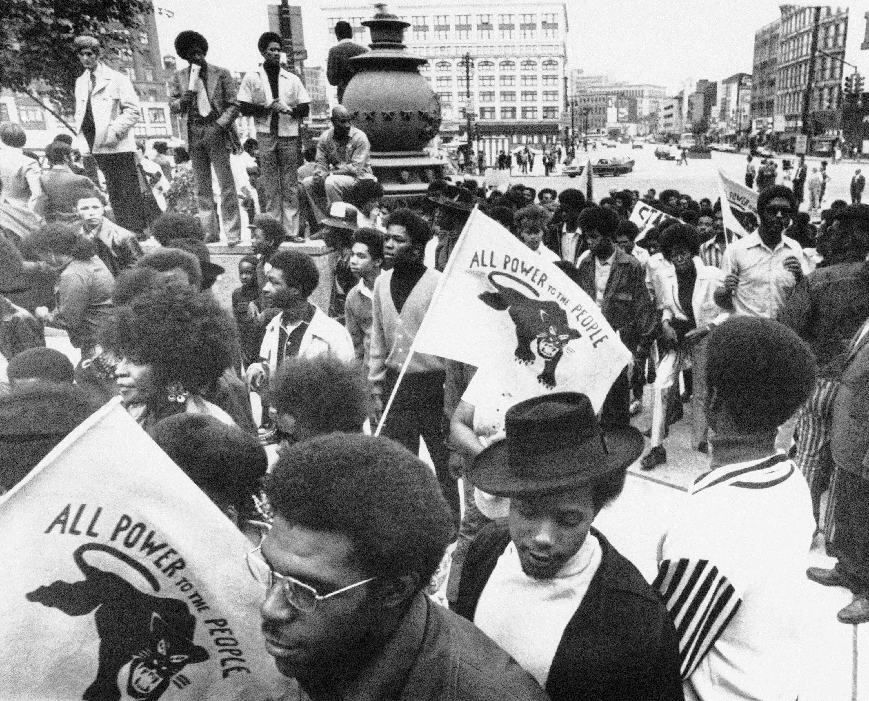 A crowd of 4,000 to 5,000 persons, some carrying Black Panther flags, staged a protest march and rally against the Detroit Police Stress unit, Thursday, Sept. 24, 1971 in Detroit. They were protesting the deaths of two black teen-age boys who were shot last Friday by an officer attached to STRESS (Stop the Robberies – Enjoys Safe Streets). This view shows the group as it entered downtown Kennedy Square.