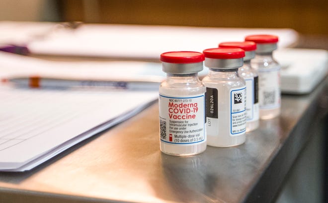 Bottles of the Moderna COVID-19 vaccine are shown inside the Beacon COVID-19 vaccine clinic at Elkhart General Hospital on Jan. 27, 2021, in Elkhart.