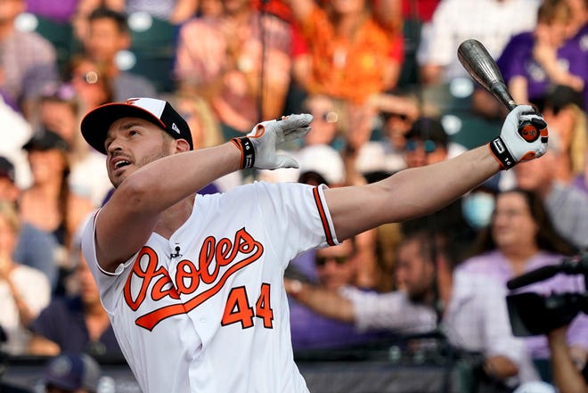 American League's Trey Mancini, of the Baltimore Orioles, hits during the first round of the MLB All Star baseball Home Run Derby, Monday, July 12, 2021, in Denver. (AP Photo/Gabriel Christus)