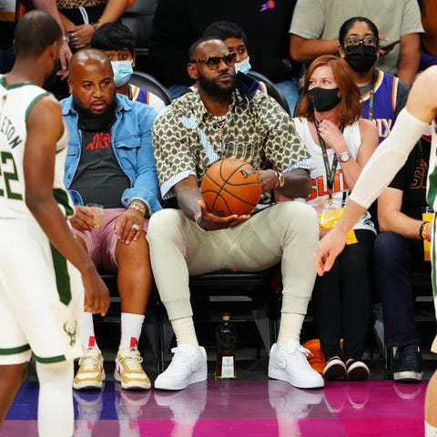LeBron James holds the ball courtside during the f