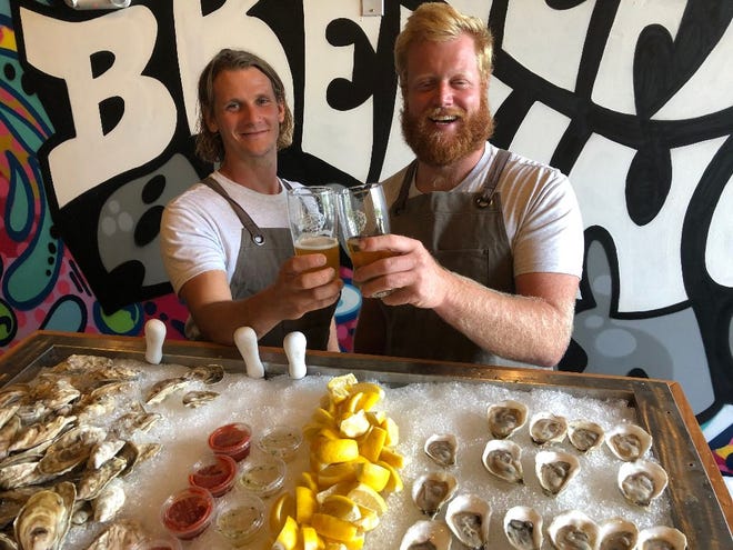 Swell Oyster Co. owners Conor Walsh, left, and Russ Hilliard were on hand last Friday at Stoneface Brewing for the release of That's a Swell Gose, a semi-tart wheat beer that was made using full oysters from the Hampton oyster company.