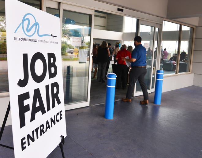 Prospective employees attend a job fair at Melbourne Orlando International Airport in July, when Florida's jobless rate stood at 5.1 percent. Since then, the rate has fallen to 4.5 percent.