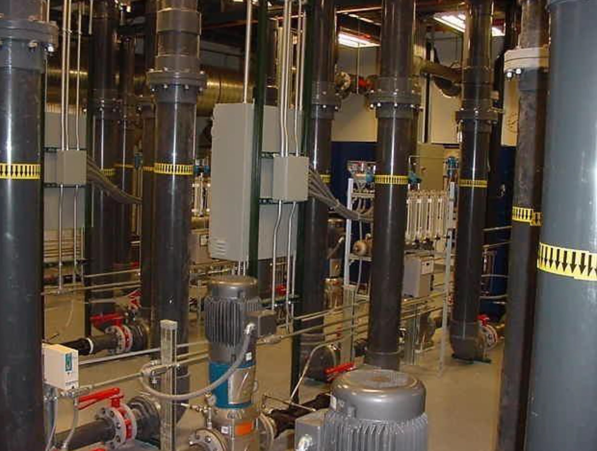This image, contained in a technical report on the Gelman Sciences site remediation prepared for the Washtenaw County Circuit Court, shows the Gelman Ozone/Hydrogen Peroxide Treatment System for reducing dioxane levels in Ann Arbor area groundwater. Gelman operates one of the largest 1,4-dioxane remediation systems in the world. Groundwater from multiple wells is pumped from the ground and transferred to Gelman’s Wagner Road facility for treatment.