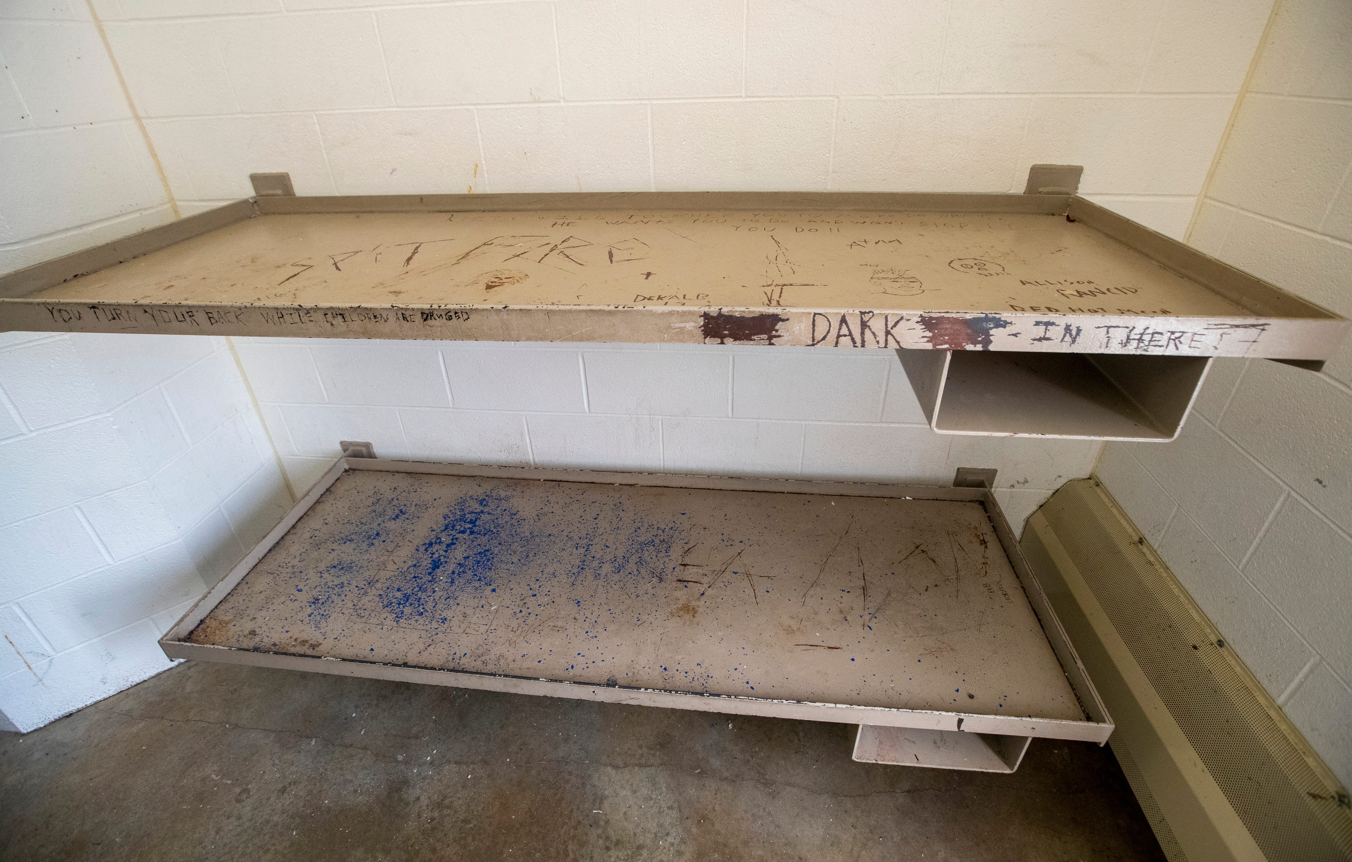 Metal bunks on Thursday, June 24, 2021, at the Allen County Jail in downtown Ft. Wayne, Ind. A thin pad is typically given to detainees, but on occasion they run out forcing people to sleep on these metal beds or on portable plastic bunks that sit on the ground.