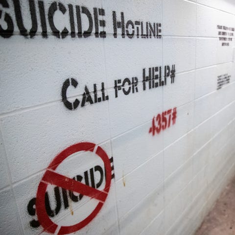 Suicide hotline information is prominently display
