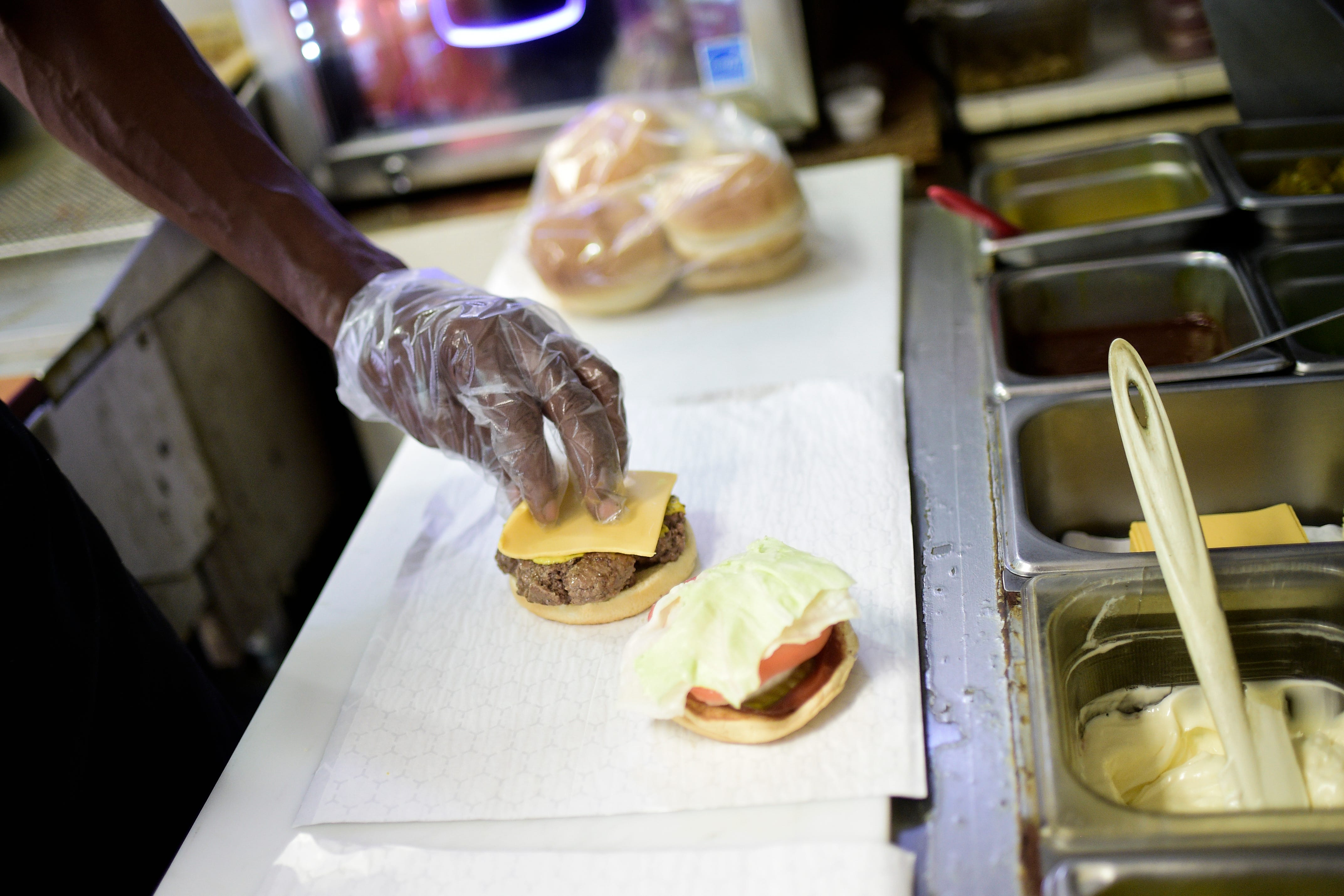 Building the perfect burger is an art form to Andre Bryant, who believes every condiment should be tasted in every bite. Each burger ordered at the Burger Boys drive-thru comes with the restaurant's signature "free fries," which are hand-cut, hand-seasoned and fried fresh.