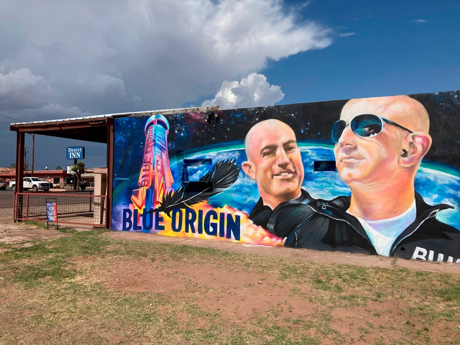 The side of a building in Van Horn, Texas, is adorned with a mural of Blue Origin founder Jeff Bezos on Saturday, July 17, 2021.