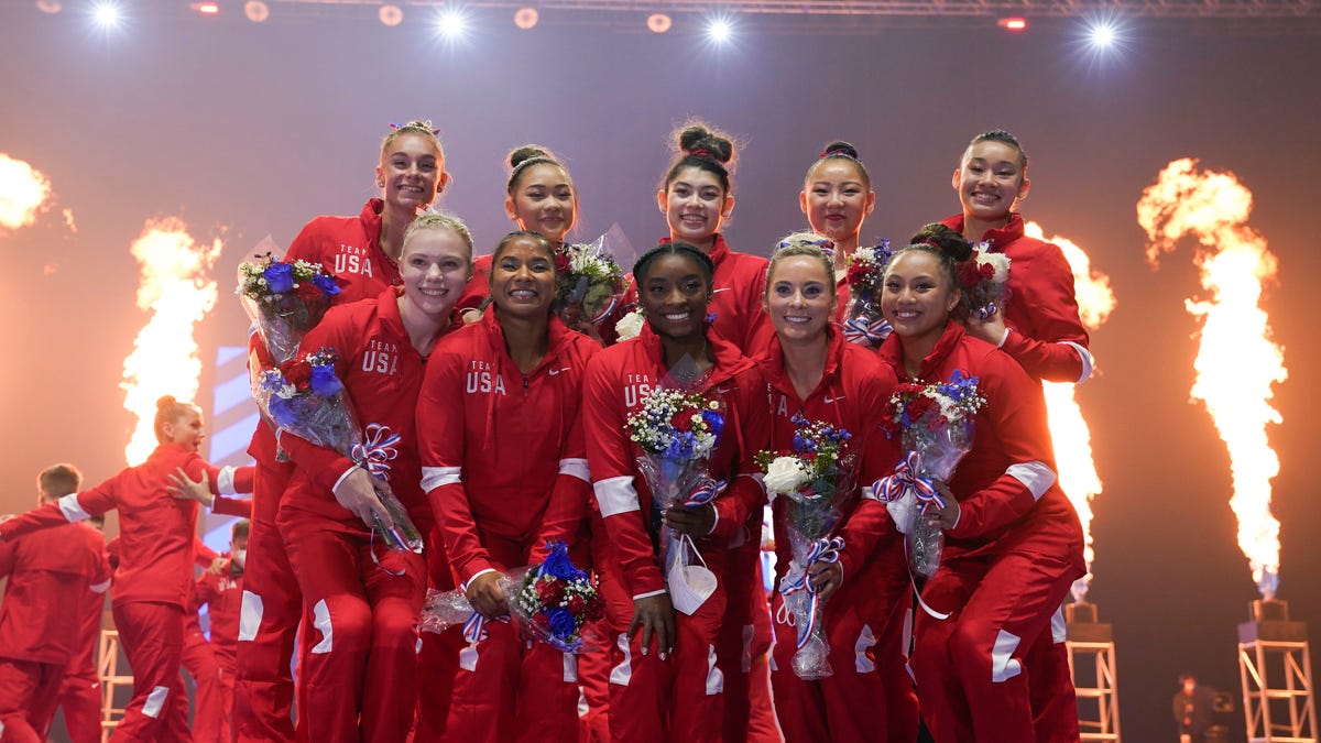 Members of the women's Olympic gymnastics team and alternates pose during the U.S. Olympic Team Trials.