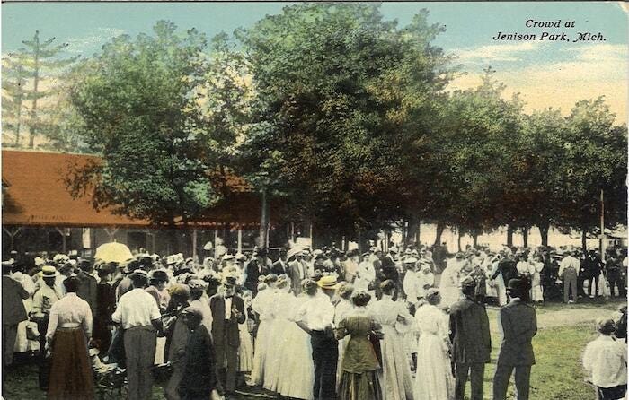 A postcard showing a large crowd of people at Jenison Electric Park.