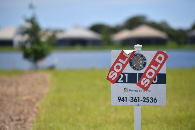 A sign marks lots that have been sold in the Lakehouse Cove at Waterside development in Lakewood Ranch. 