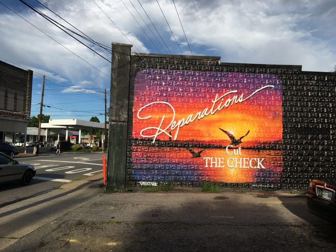 A pro-reparations mural in West Asheville