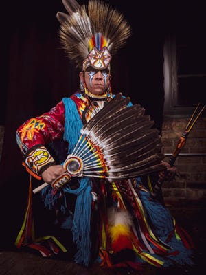 Ronnie Preston, of St. Francis, is a Native American cultural educator who travels the nation as a one-man show. He is pictured here in his tribal regalia, which features eagle feathers, porcupine hair, otter fur and bear claws.