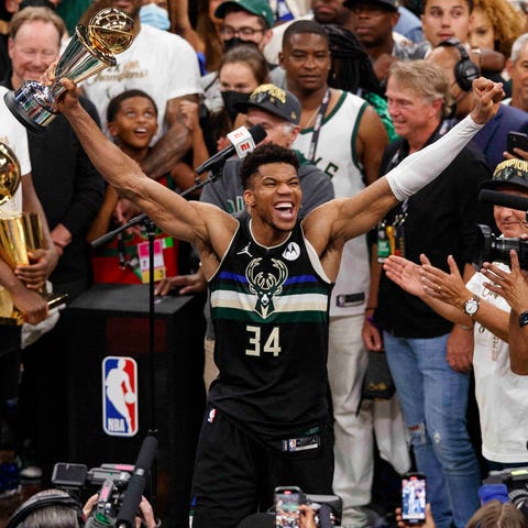 Giannis Antetokounmpo leads the celebration after 
