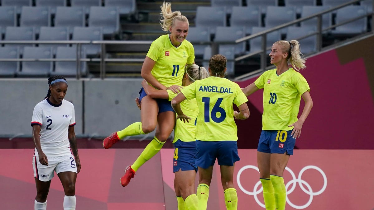 Sweden forward Stina Blackstenius (11) celebrates with teammates after scoring a goal against the U.S. team during the first half at the Tokyo 2020 Olympic Summer Games at Tokyo Stadium.