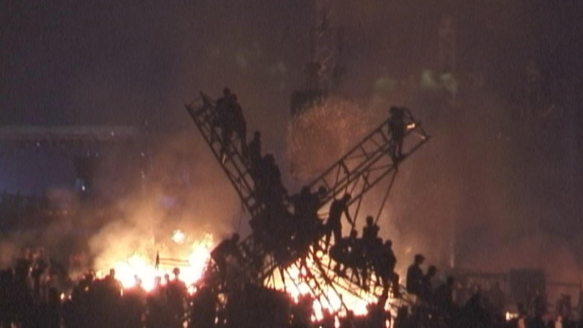 Fires erupted Sunday, July 25, 1999 as Woodstock 99 came to a close.