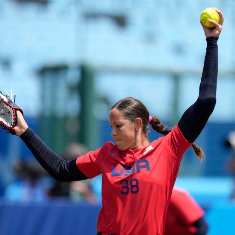 Cat Osterman pitches during the softball game betw