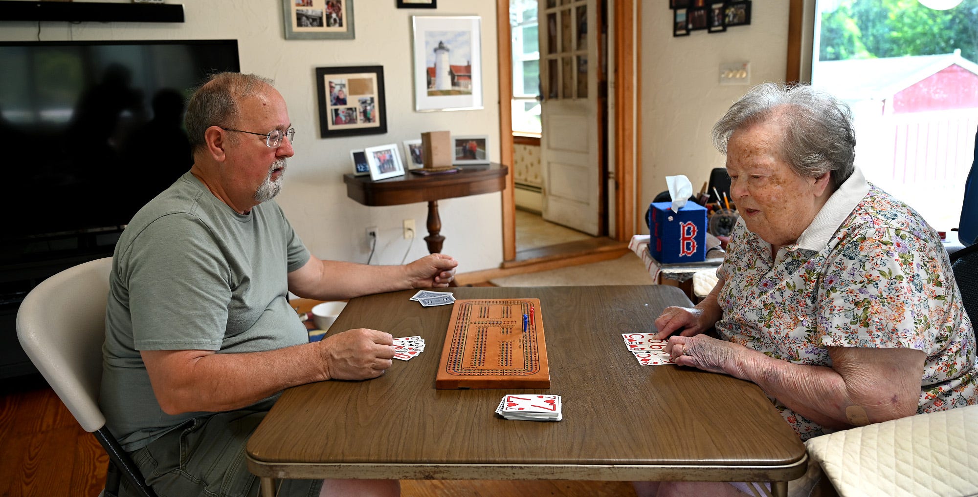 A Navy veteran, a wife and mother, a cribbage player, and more. Jini Henderson turns 100.
