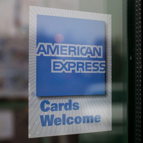 A sign welcoming American Express cardholders is s